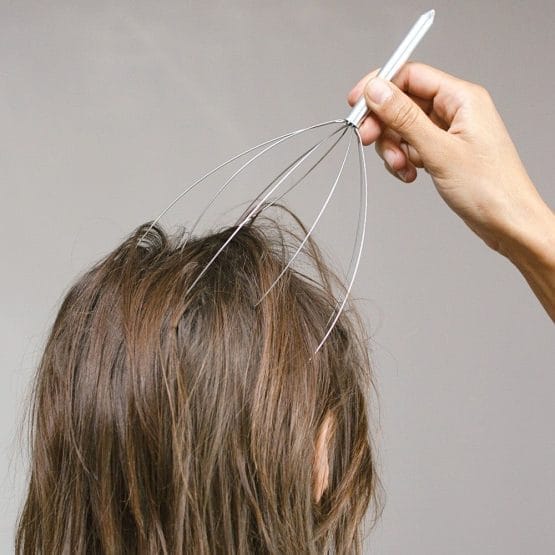 Masajeador metal cabeza en bolsa