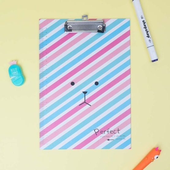 Tabla con aprieta papel diseño caritas