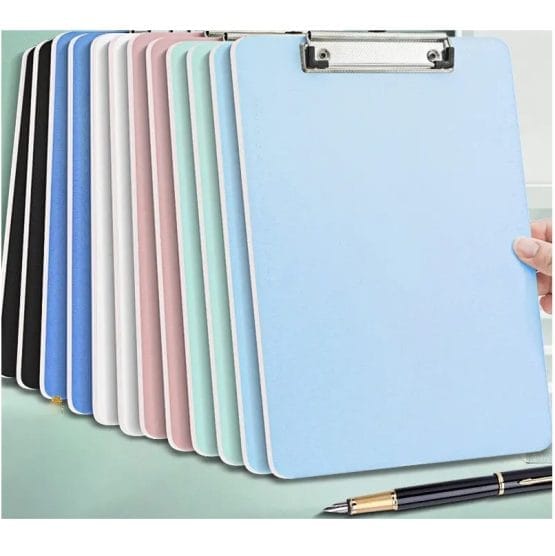 Tabla con aprieta papel colores pasteles