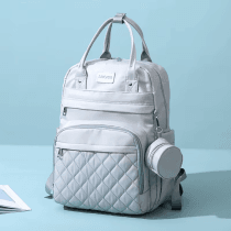 Mochila estilo maternal con monedero capitoneada