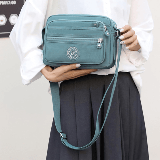 Bandolera rectangular tres bolsillos