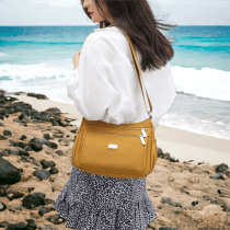 Cartera con bolsillos laterales varios colores