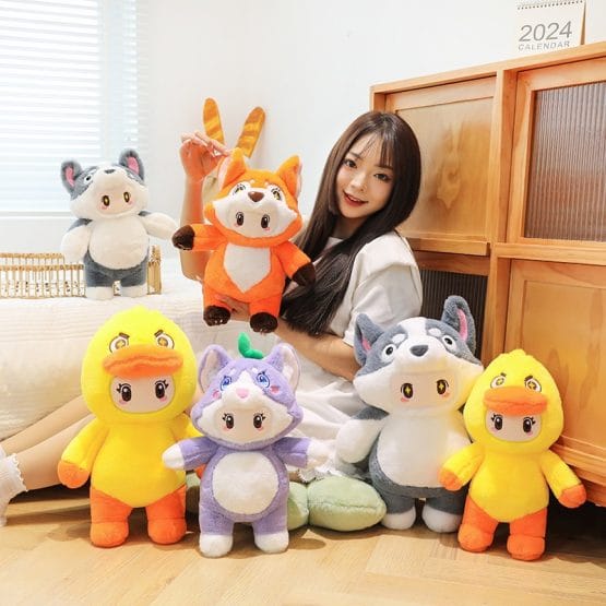 Peluche muñeco con pijama animalitos 40 cm.