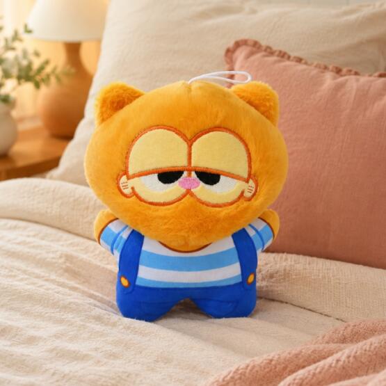 Peluche gatito naranja con overol 20-25cm