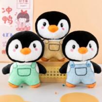 Peluche pinguino con overol 20-25cm