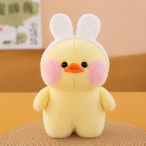 Peluche patito amarillo con orejas de conejo 20-25cm