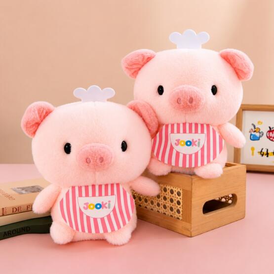 Peluche cerdito con delantal y gorro 20-25cm